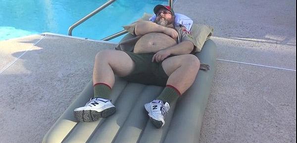  Big Bear jacking off on top of an inflatable air mattress